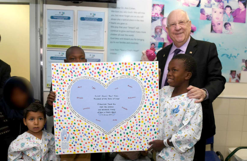 President Reuven Rivlin visits children treated for Save a Child's Heart (photo credit: Mark Neiman/GPO)
