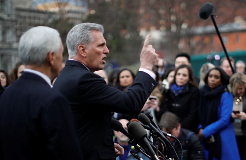 House Minority Leader Kevin McCarthy speaks to the news media with Vice President Mike Pence, 2019. (photo credit: REUTERS/CARLOS BARRIA)