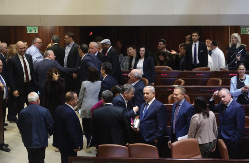 A scene in the Knesset before it votes for an early election on April 9 (photo credit: MARC ISRAEL SELLEM)