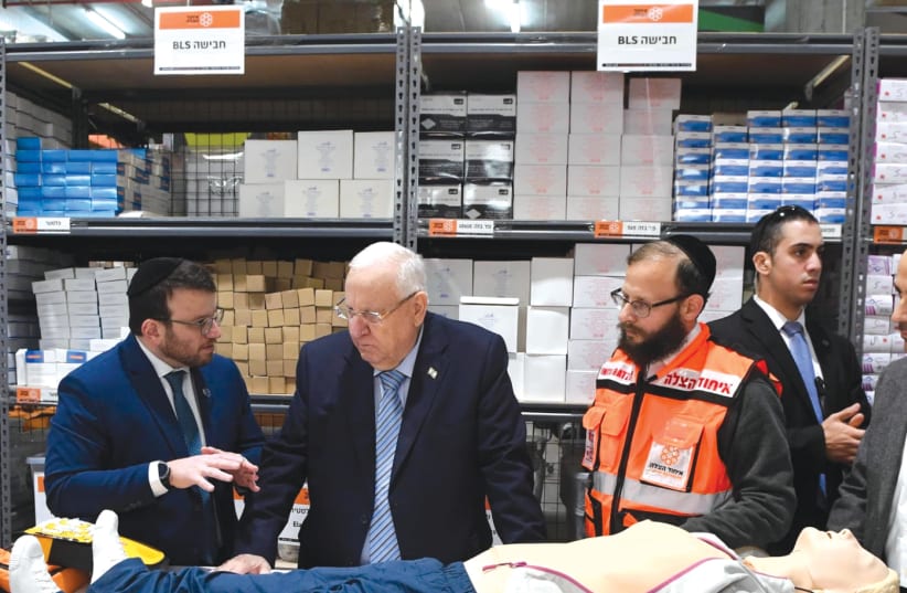 PRESIDENT REUVEN RIVLIN learns about United Hatzalah’s lifesaving techniques (photo credit: MARK NEYMAN/GPO)