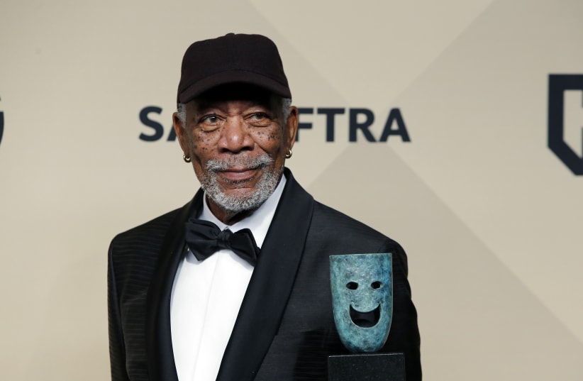 Morgan Freeman poses with the 54th Annual SAG Life Achievement Award. (photo credit: MONICA ALMEIDA/REUTERS)