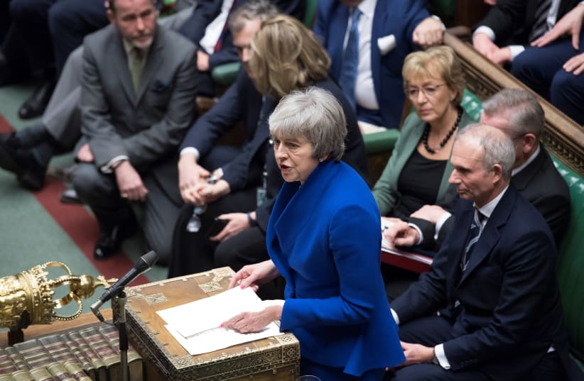 BRITISH PRIME MINISTER Theresa May speaks during a confidence vote debate after Parliament rejected her Brexit deal, in London, Wednesday.  (photo credit: REUTERS/JESSICA TAYLOR)