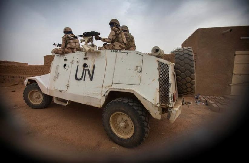 Members of MINUSMA Chadian contingent patrol in Kidal, Mali (photo credit: REUTERS)
