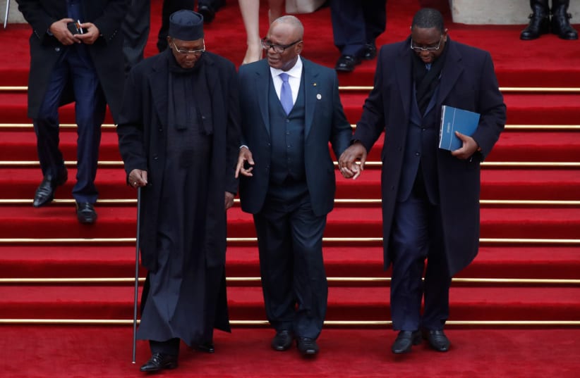 Chad's President Idriss Deby Itno , Mali’s President Ibrahim Boubacar Keita and Senegalese President Macky Sall leave after a lunch at the Elysee Palace in Paris as part of the commemoration ceremony for Armistice Day, 100 years after the end of the First World War, France, November 11, 2018 (photo credit: REUTERS/PHILIPPE WOJAZER)