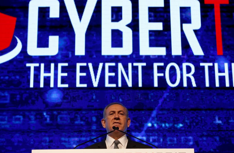 Prime Minister Benjamin Netanyahu delivers a speech at a Cyber Security Conference in Tel Aviv, Israel January 31, 2017 (photo credit: BAZ RATNER/REUTERS)
