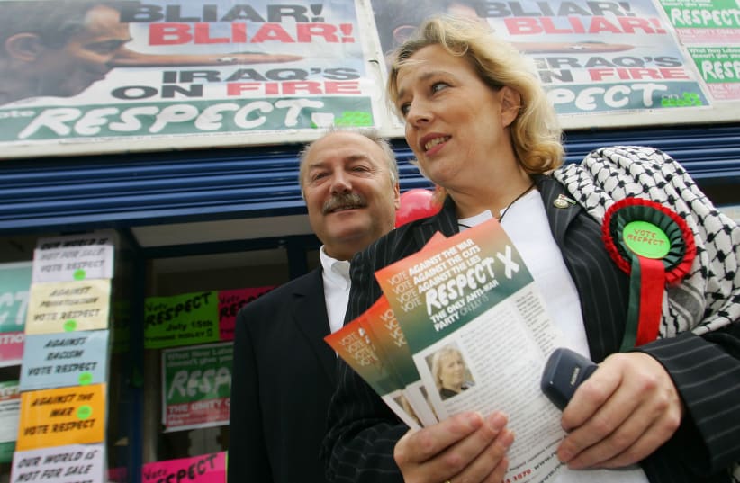 Leader of Britain's Respect party, George Galloway (L), and party candidate Yvonne Ridley (R) convas during a by-election in the Leicester South constituency in central England, July 15, 2004 (photo credit: DARREN STAPLES/REUTERS)