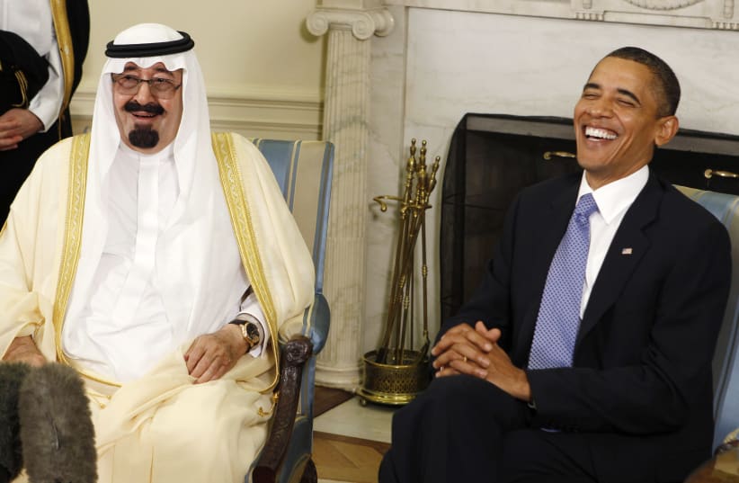 Barack Obama (R) laughs as he meets with King Abdullah of Saudi Arabia in the Oval Office of the White House in Washington June 29, 2010 (photo credit: LARRY DOWNING/REUTERS)