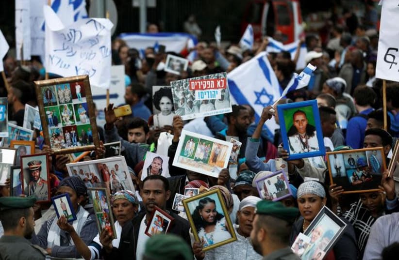 Israelis of Ethiopian descent take part in a protest (photo credit: REUTERS/Ronen Zvulun)