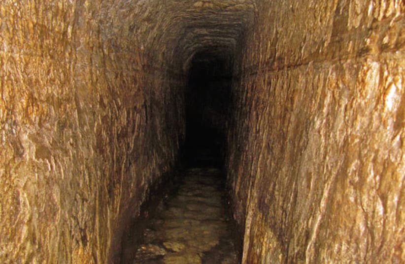 ‘BEST KNOWN in Jerusalem is a fifth-century Byzantine pool adjacent to the Siloam Tunnel (pictured).’ (photo credit: Wikimedia Commons)