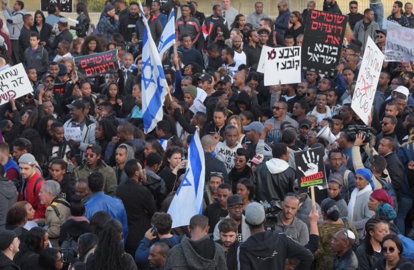 Ethiopian Jews protest in Tel Aviv after the murder of 24-year-old Yehuda Biagda due to police brutality, Jan. 2019. (photo credit: AVSHALOM SASSONI)