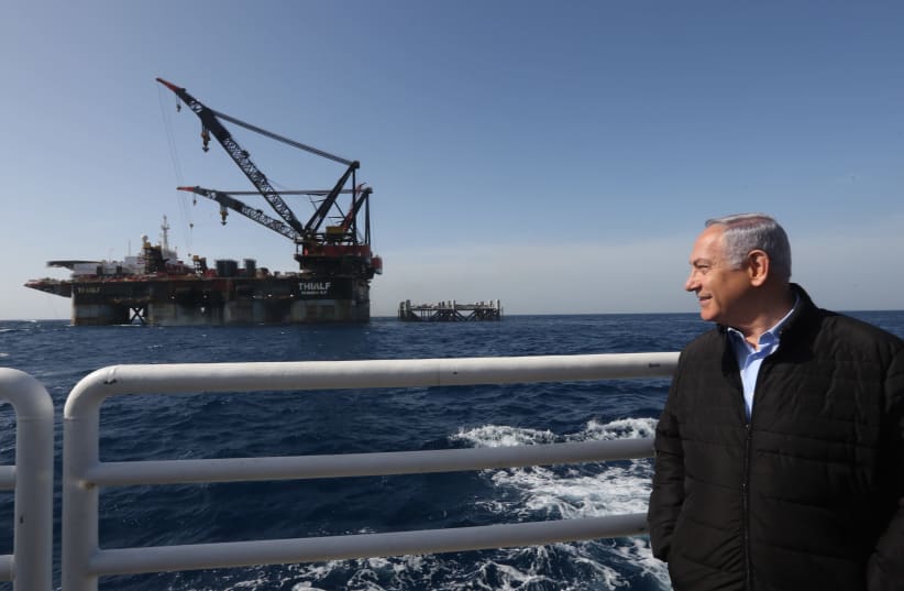 Prime Minister Benjamin Netanyahu looks on in front of the Leviathan gas platform (photo credit: MARC ISRAEL SELLEM)
