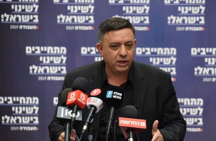Labor leader Avi Gabbay speaks to mayors from his party Thursday in Haifa (photo credit: ELAD GUTMAN)