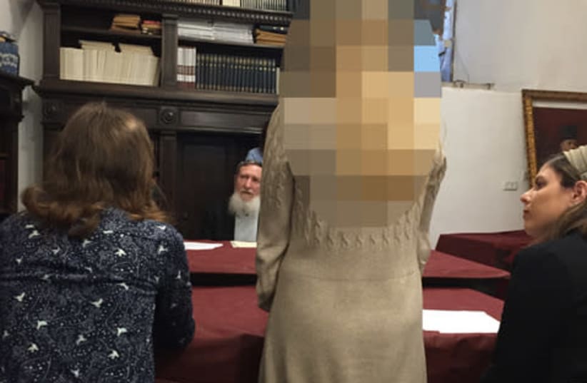 The Independent rabbinical court headed by Rabbi Daniel Sperber (center) issues its ruling on Sunday annulling her marriage to her former husband (photo credit: Courtesy)
