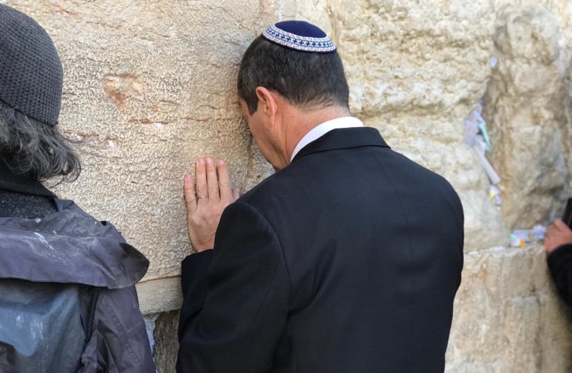Nir Barkat prays at the Kotel on the day of the Likud primaries. (photo credit: Courtesy)