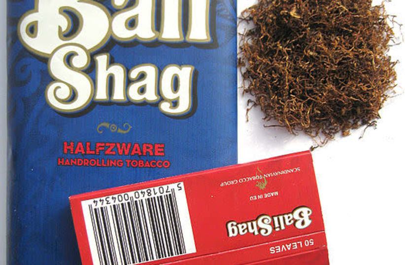 A 40g pouch of Bali Shag Halfzware, Bali Shag Halfzware tobacco and red Bali Shag rolling papers (photo credit: HANGFIB/WIKIMEDIA COMMONS)