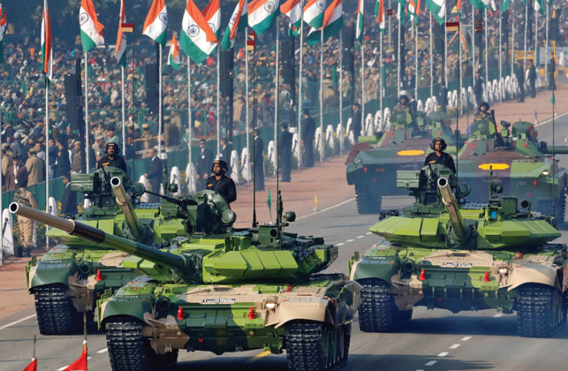 INDIAN ARMY T-90 Bhishma tanks are displayed during the Republic Day parade in New Delhi on January 26. (photo credit: REUTERS)