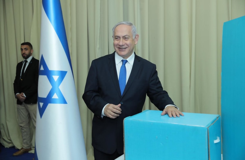 Prime Minister Benjamin Netanyahu after voting in the Likud primaries (photo credit: LIKUD)