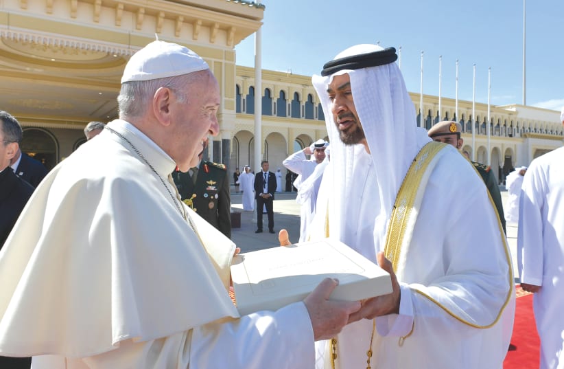 POPE FRANCIS talks with Abu Dhabi’s Crown Prince Mohammed bin Zayed Al-Nahyan during a farewell ceremony before leaving Abu Dhabi earlier this week (photo credit: REUTERS)