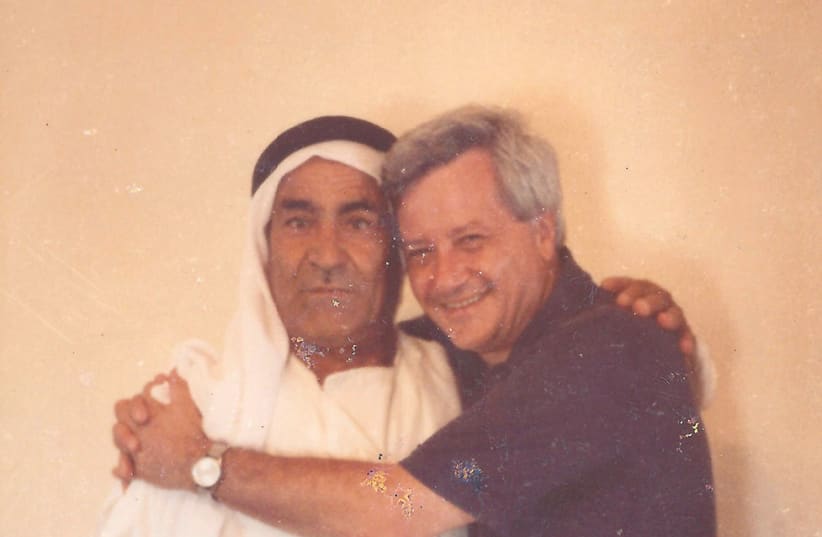 ARNOLD BASKIN and his friend Abu Ali Abu Zghair in Kafr Kara in 1979 (photo credit: Courtesy)