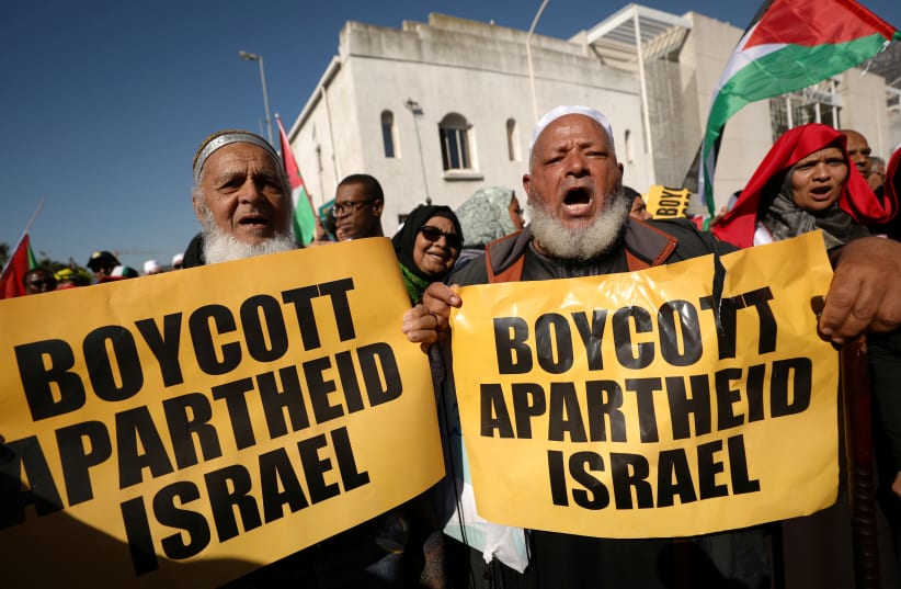 Protestors call for the severing of diplomatic ties with Israel during a march in Cape Town (photo credit: MIKE HUTCHINGS / REUTERS)