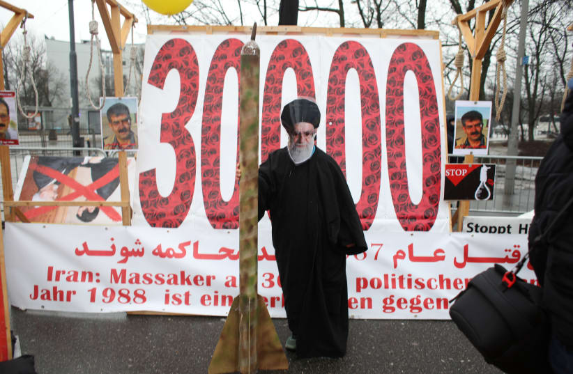 Iranian communities in Europe hold a rally to protest against Iranian government's human rights violations during a global summit focused on the Middle East and Iran in Warsaw, Poland February 13, 2019 (photo credit: AGENJCA GAZETA/ REUTERS)
