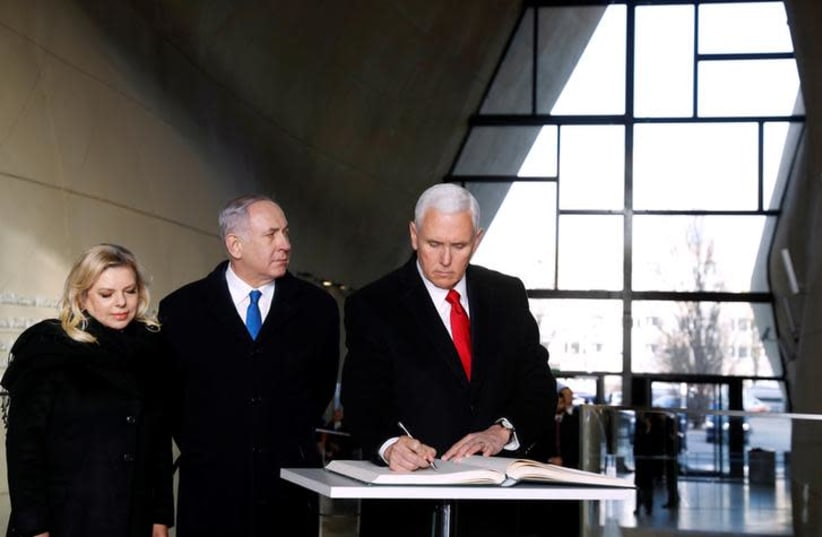 U.S. Vice President Mike Pence, Prime Minister Benjamin Netanyahu and his wife Sara visit the Jewish Museum in Warsaw, Poland, February 14, 2019 (photo credit: KACPER PEMPEL / REUTERS)