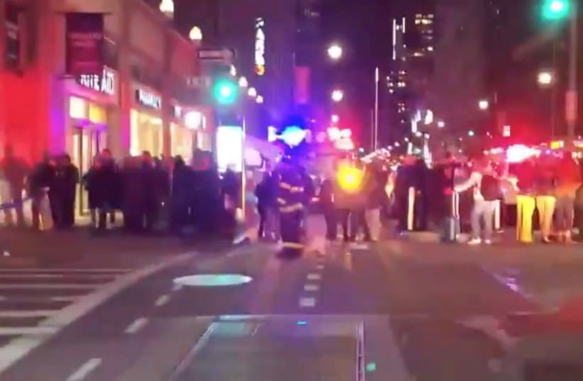 Fire and emergency personnel gather at a scene after explosions were heard in New York (photo credit: SOCIAL MEDIA)