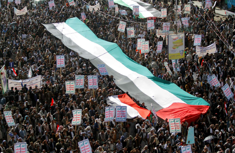 Protesters gather during a rally against the Middle East conference in Warsaw, in Sanaa, Yemen February 17, 2019  (photo credit: REUTERS/MOHAMED AL-SAYAGHI)
