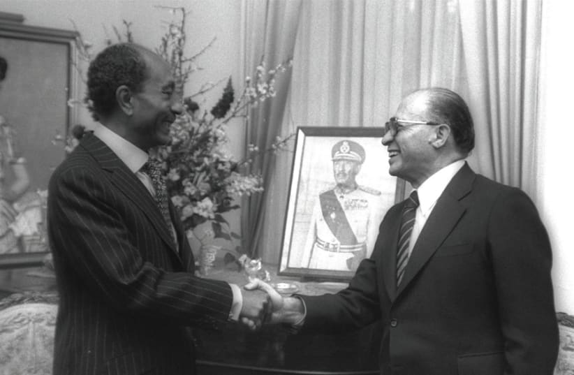 Prime Minister Menachem Begin meets with Egyptian President Anwar Sadat at the Egyptian Embassy in Washington before signing the Egypt-Israel Peace Treaty 40 years ago (photo credit: YAACOV SAAR/GPO)