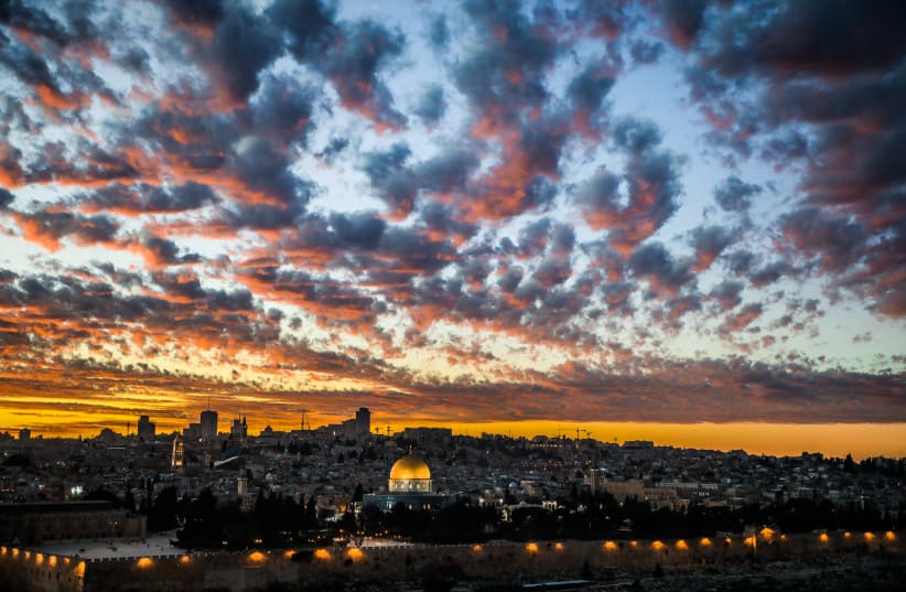 The Dome of the Rock mosque is seen during the sunset at the al-Aqsa mosque compound (photo credit: SAEED QAQ/NURPHOTO VIA AFP)