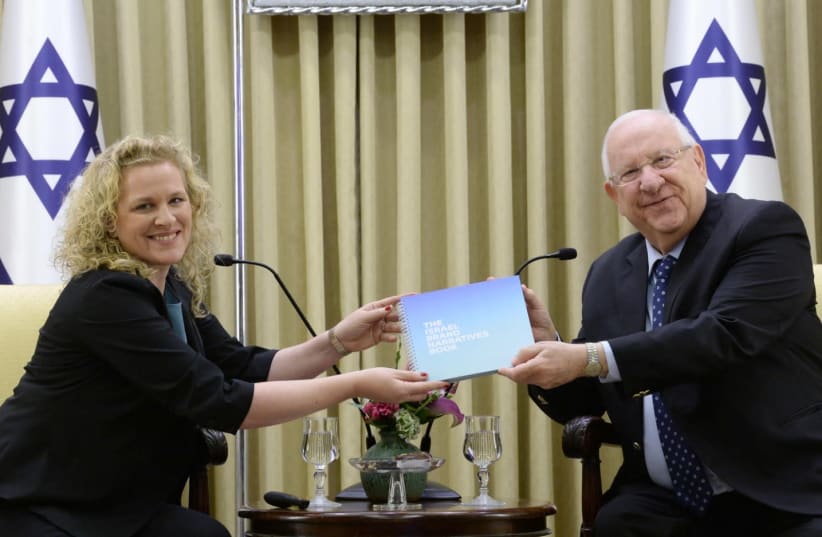 CEO of Vibe Israel Joanna Landau [L] and to President Reuven Rivlin [R] at the presentation of the new study conducted by Bloom Consulting for Vibe Israel  (photo credit: MARC NEYMAN/GPO)