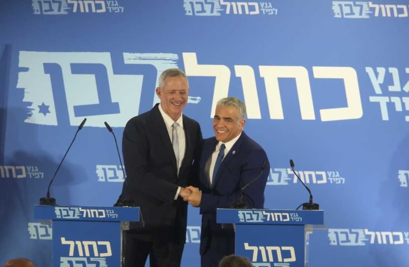 Benny Gantz (L) and Yair Lapid (R) anounce the Blue and White Party (photo credit: MARC ISRAEL SELLEM/THE JERUSALEM POST)