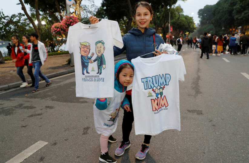 T-shirts depicting North Korea's leader Kim Jong Un and U.S. President Donald Trump for sale on a Vietnamese street ahead of the summit in Hanoi, February 23, 2019 (photo credit: JORGE SILVA / REUTERS)