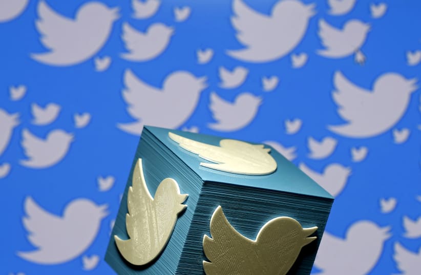 A 3D-printed logo for Twitter is seen in this illustrative picture (photo credit: DADO RUVIC/REUTERS)