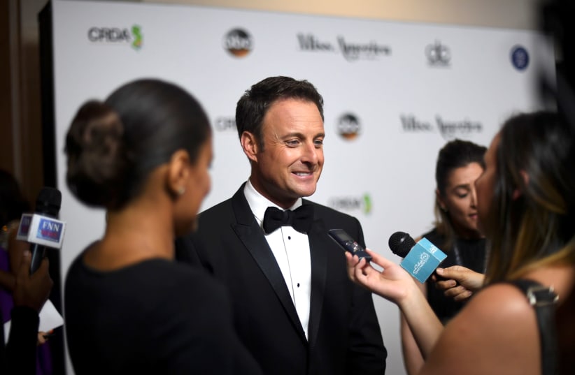 Host Chris Harrison is interviewed on the red carpet of Boardwalk Hall before the 96th Miss America Pageant in Atlantic City, New Jersey, U.S. September 11, 2016. Picture taken September 11, 2016. (photo credit: MARK MAKELA / REUTERS)