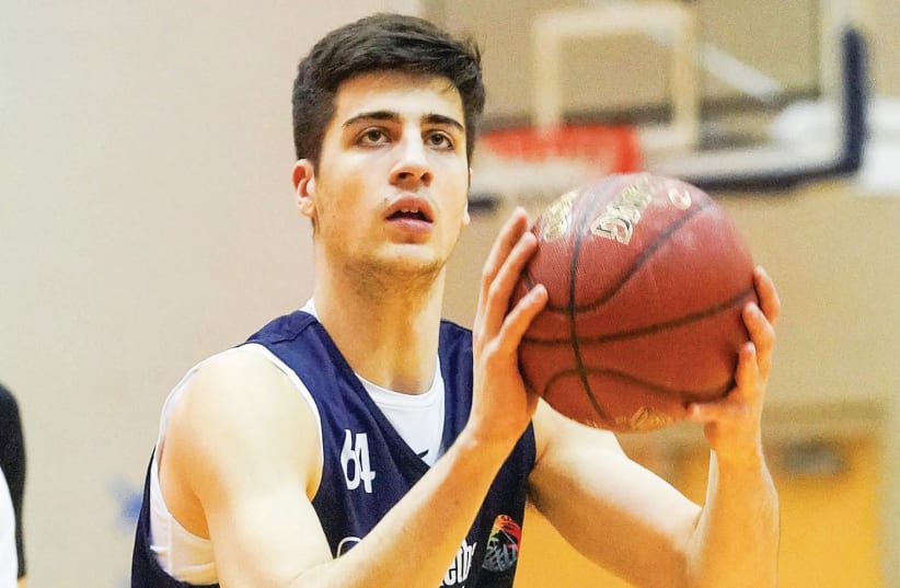 Deni Avdija, 18, has all the tools to become the next Israeli basketball player to play in the NBA (photo credit: REUTERS)
