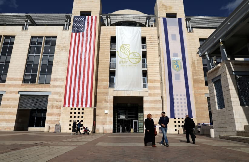 City Hall in Jerusalem drapped in an American flag in 2017 (photo credit: REUTERS)