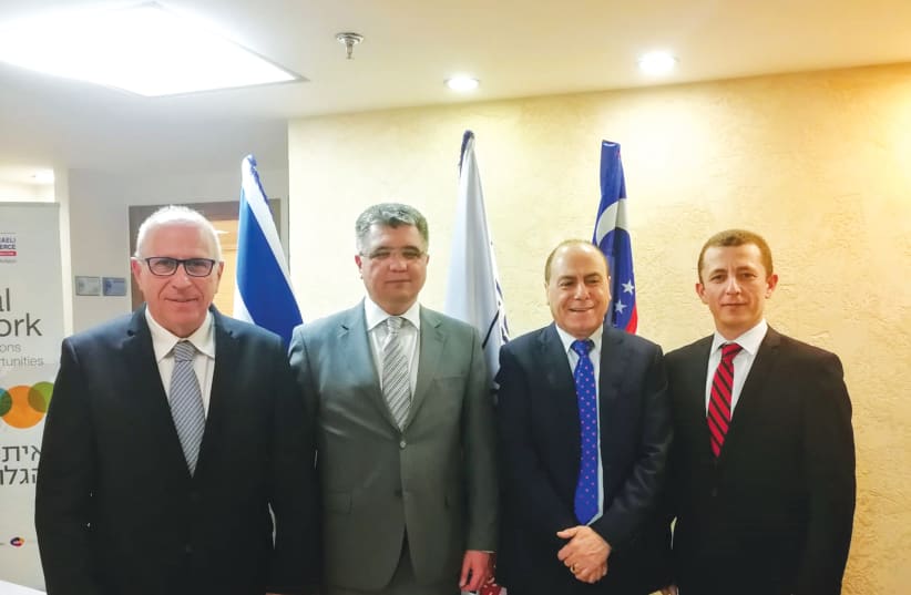 FROM LEFT: Amir Shani, Dilshod Akhatov, Silvan Shalom and Said Rustamov meet at a roundtable meeting to promote a series of bilateral commercial and economic relationships.  (photo credit: Courtesy)