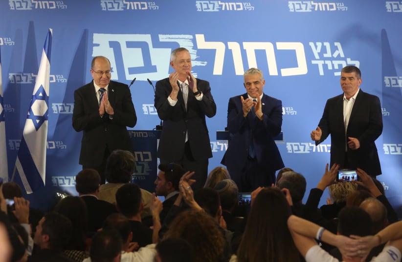 Moshe Ya’alon, Benny Gantz, Yair Lapid and Gabi Ashkenazi announce the formation of their joint party, Blue and White, in Tel Aviv on February 21st, 2019 (photo credit: MARC ISRAEL SELLEM/THE JERUSALEM POST)
