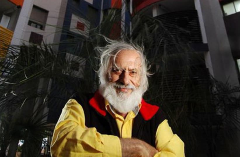 Yaacov Agam, 90, in front of a building he decorated in Tel Baruch (photo credit: Wikimedia Commons)