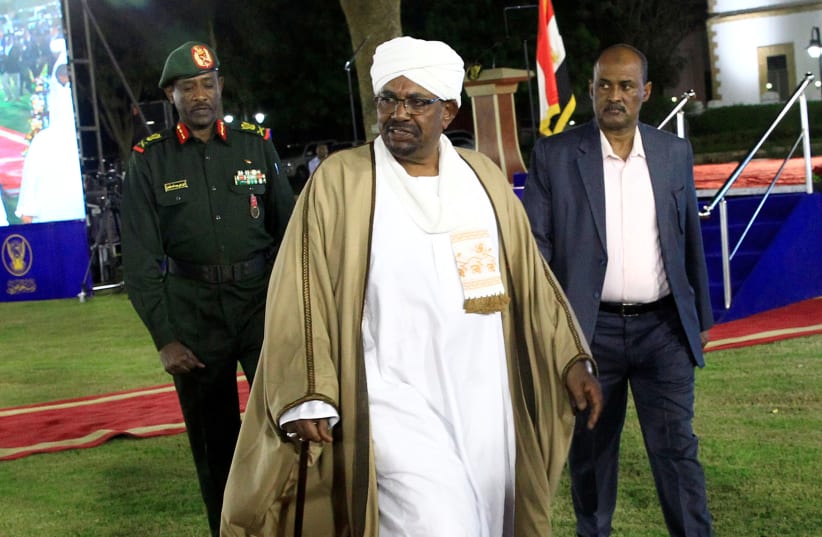 Sudan's President Omar al-Bashir leaves after delivering a speech at the Presidential Palace in Khartoum, Sudan February 22, 2019 (photo credit: MOHAMED NURELDIN ABDALLAH/REUTERS)