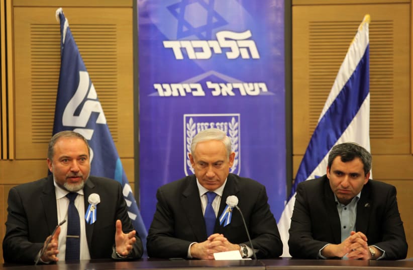 Benjamin Netanyahu (C), Avigdor Liberman (L) and Ze'ev Elkin (R), during a meeting between the Likud and Yisrael Beytenu parties (photo credit: MARC ISRAEL SELLEM/THE JERUSALEM POST)