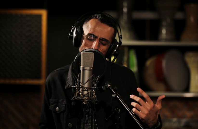 Bashar Murad in a studio (REUTERS/Ammar Awad) (photo credit: REUTERS/AMMAR AWAD)