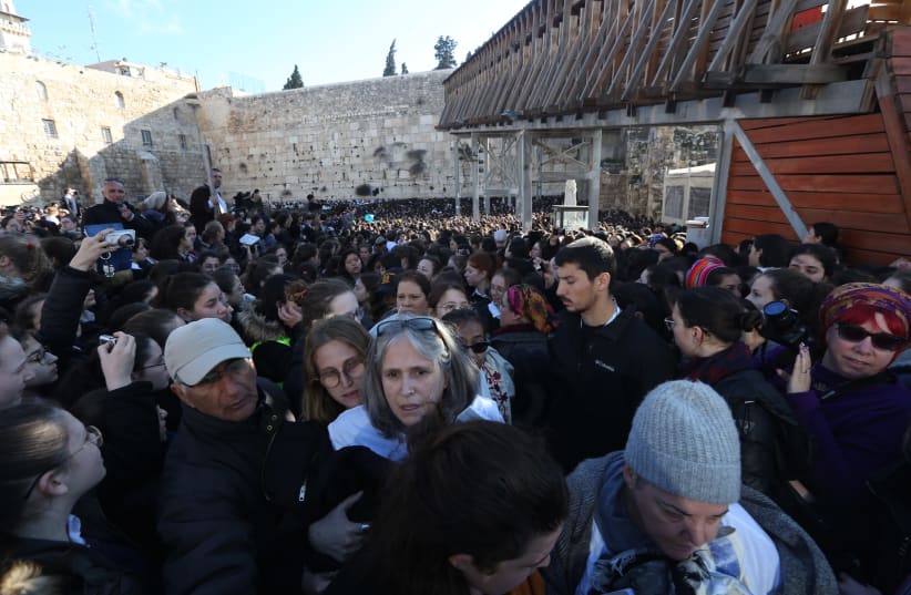 Women of the Wall clashing with Orthodox worshipers (photo credit: MARC ISRAEL SELLEM)