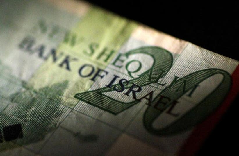 An Israel Shekel note (photo credit: REUTERS/THOMAS WHITE)