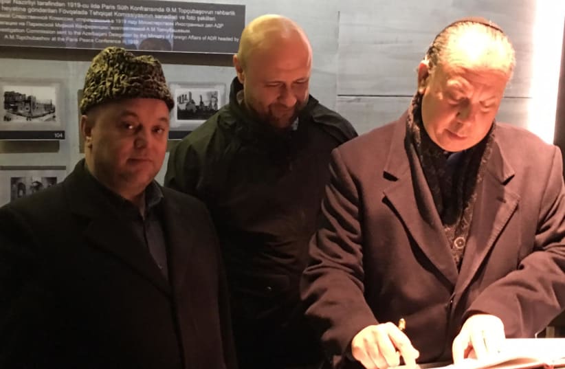 From right to left: Rabbi Marc Schneier, Bishop Robert Stearns and an Imam from the trip to Azerbaijan at the Guba Genocide Memorial (photo credit: THE FOUNDATION FOR ETHNIC UNDERSTANDING (FFEU))