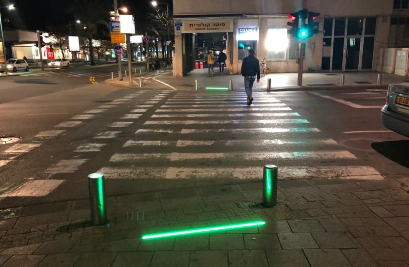 Tel Aviv-Yafo Municipality installs sidewalk LED lights to protect 'smartphone zombies' (photo credit: TEL AVIV-JAFFA MUNICIPALITY)