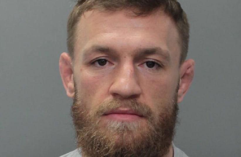 UFC fighter Conor McGregor appears in a police booking photo at Miami-Dade County Jail in Miami (photo credit: REUTERS)