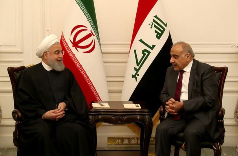 Iraq's Prime Minister Adel Abdul Mahdi meets Iranian President Hassan Rouhani in Baghdad, Iraq March 11, 2019 (photo credit: REUTERS)