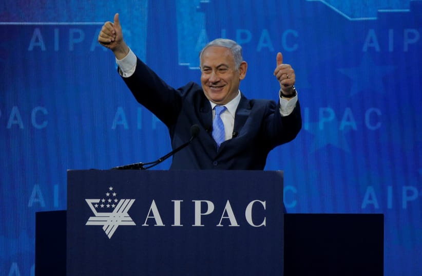 Prime Minister Benjamin Netanyahu speaks at the AIPAC policy conference in Washington, DC, U.S., March 6, 2018 (photo credit: BRIAN SNYDER/REUTERS)